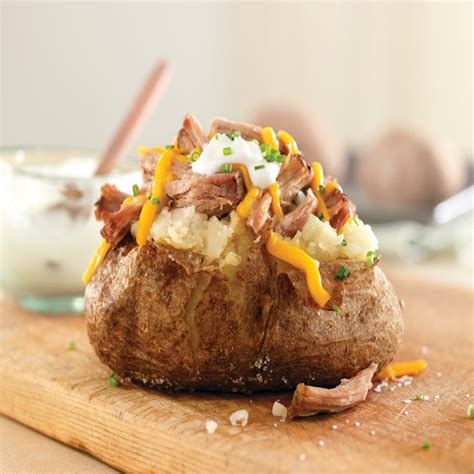 Baked potatoes are an easy and inexpensive side dish to make. Pulled Pork Baked Potato | Recipes, Cooking recipes ...