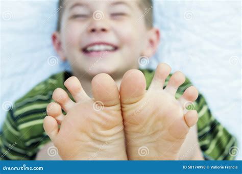 Boy Laughing Barefoot Toes Stock Photo Image Of Wiggling 58174998