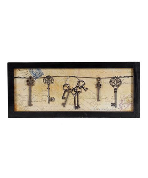 An Old Fashioned Key Frame With Keys Hanging From It