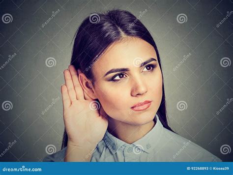 Woman With Hand To Ear Gesture Listening Carefully Stock Image Image