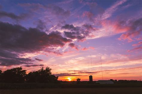 Hd Wallpaper Iowa Farm Sky Sunset Clouds Plants Corn Silo Nature Wallpaper Flare