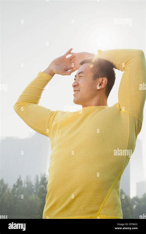 Young Muscular Man Stretching Stock Photo Alamy