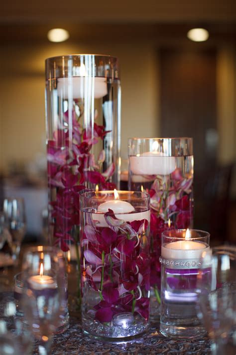 Purple Orchid And Floating Candle Centerpieces