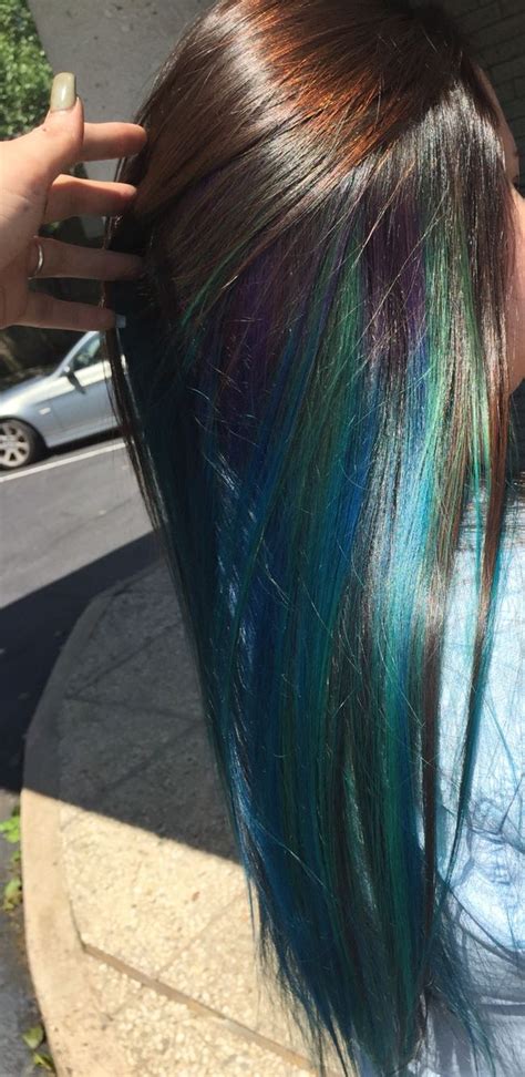 Blue Blend With Hint Of Purple Underneath Layer Of Dark Brown Blue
