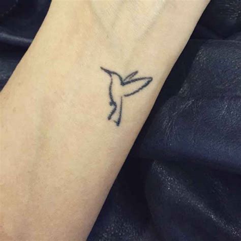 Wrist Tattoo Of A Hummingbird On Brittany