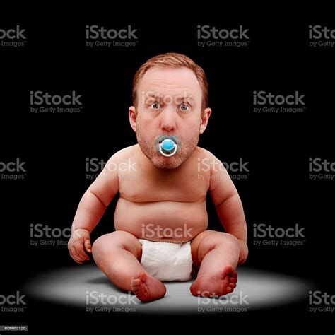 Man Baby Under Spotlight Stock Photo - Download Image Now - iStock