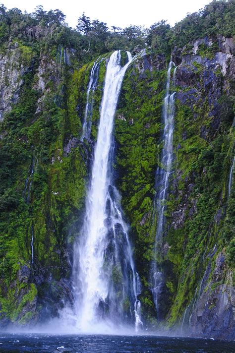 Huge Waterfall In Milford Sound Fiordland National Park Unesco World