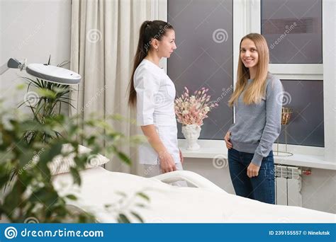 Aesthetic Medicine Specialist Speaking To Client In Clinic Stock Image