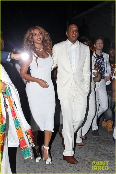 The picture show a joyful beyoncé in a stunning white strapless gown (designed by her mother) — her right hand raised in triumph as she cheers towards the sky. Beyonce & Jay-Z Celebrate Solange Knowles' Wedding to Alan ...