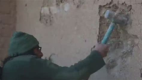 ISIS Militants Destroy Antiquities With Sledgehammer CNN Video