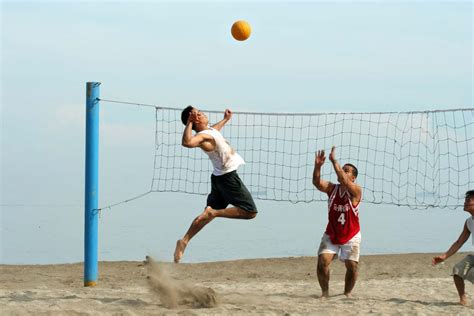 A volleyball court provides an excellent spot to host outdoor gathering. Beach volleyball | sport | Britannica