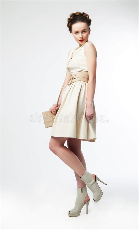 Cute Woman Fashion Model In Retro Dress Posing Stock Image