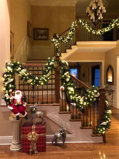 Christmas Decorations And Presents On The Stairs In Front Of A