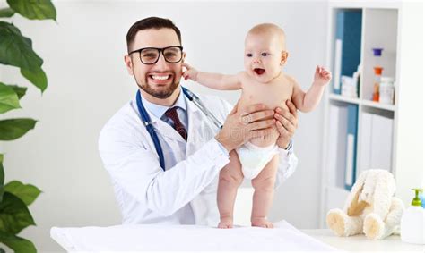 Doctor Pediatrician With Baby Child Stock Image Image Of Heartbeat