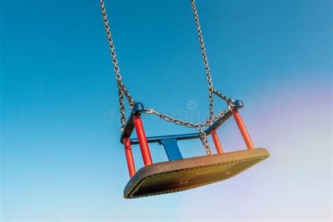 Empty Children S Swing Flies Free In The Sky Stock Image Image Of