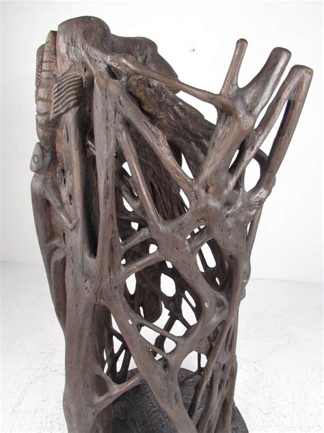 Unique Tribal Style Hand-Carved Tree Trunk Sculpture For Sale at 1stDibs