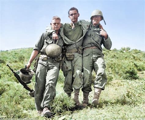 Soldiers Help Wounded Comrades In Colorized Korean War Images