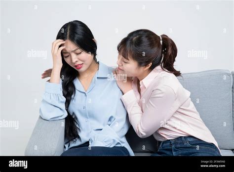 Asian Woman Comforting Sad Depressed Sister Stock Photo Alamy