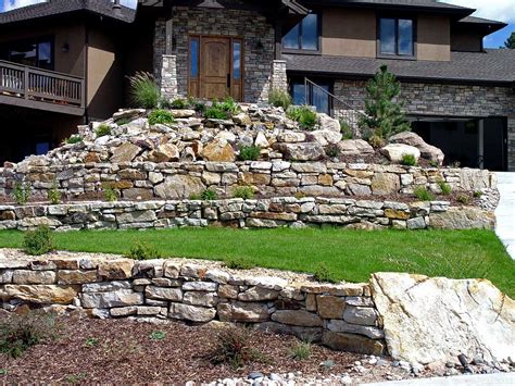 They support a portion of land in a delimited space by opposing its thrust. Siloam Stone | Boulder Retaining Walls | Colorado Quarry