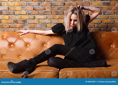 Fashion Young Girl On Leather Sofa Stock Image Image Of Studio Room