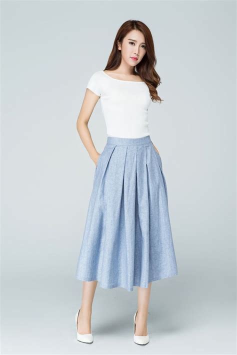 A Line Pleated Midi Skirt In Blue Linen Skirt Pockets Etsy Pleated