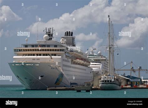 Two Cruise Ships Four Sailing Ship At Terminal In Aruba Hi Res Stock