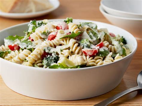 In the bowl of a food processor fitted with a steel blade, purée the pesto, spinach, and lemon juice. ina garten broccoli bow tie pasta