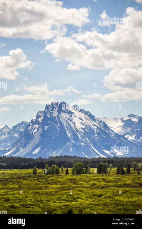 Snowy Mountain Scenery Of Grand Teton Peak United States Stock Photo