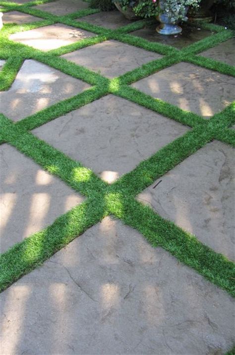 An Outdoor Area With Grass In The Shape Of Squares