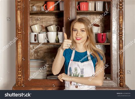 Beautiful Girl Kitchen Wearing Apron Smiles Stock Photo 432989599