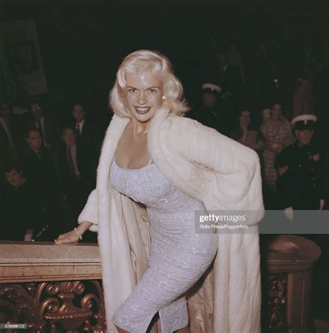 American Actress Jayne Mansfield Posed Wearing A Low Cut White Photo