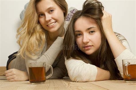 Two Attractive Friends Drinking Tea Stock Photo Image Of Life Foot