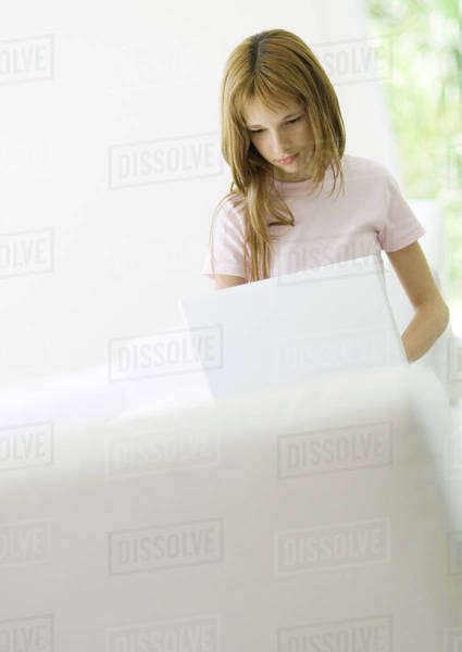 Preteen Girl Using Laptop Stock Photo Dissolve