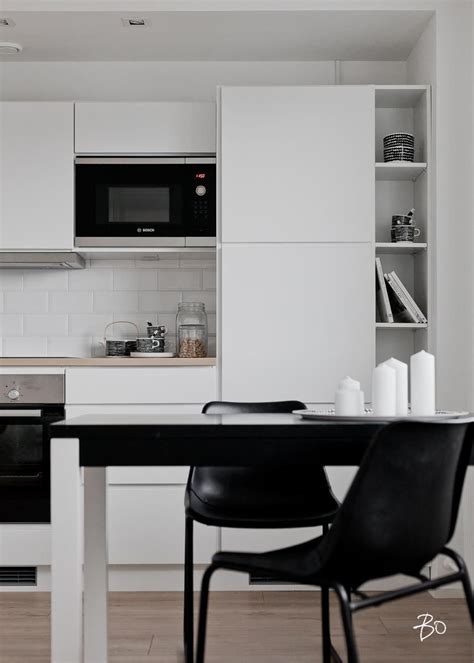 To emphasize the decluttered, minimalist aesthetic, keep countertops and shelving free from unnecessary wares and appliances. KuvakulmA | Scandinavian interior kitchen, Kitchen interior, Kitchen design small