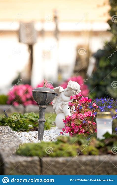 I've never left flowers on a grave before and i wouldn't want to leave ones that seem inappropriate for this kind of grave in particular. Angel At Cemetery, Grave With Open Book Out Of, Flowers ...