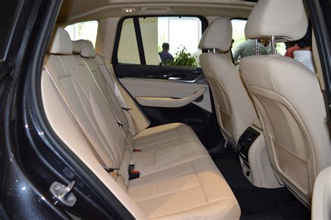 2018 bmw x3, in glittery phytonic blue metallic paint. 2018 BMW X3 Black Sapphire rear seat