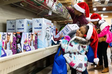 goodwill holds holiday shopping spree event for local families henderson local