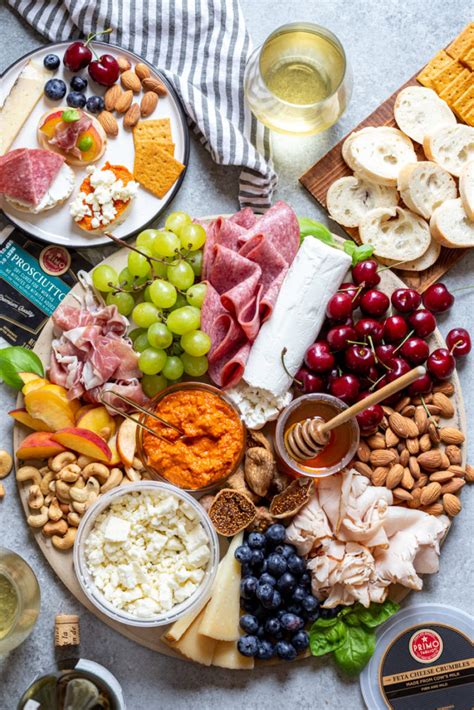 The second puts hummus, tapenade, nuts and crudités front and center for your vegan friends. Easy Summer Charcuterie Board - Strawberry Blondie Kitchen