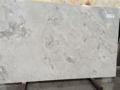 Dolomite. Light gray. For countertops, softer than granite, harder than