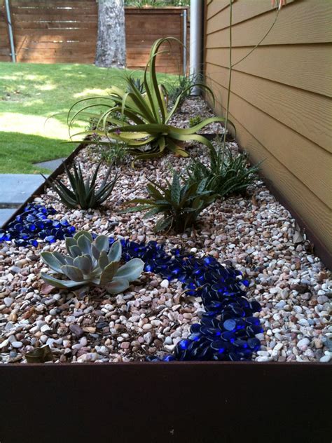 Steel Planter With Succulents River Rock And Blue Glass River Rock
