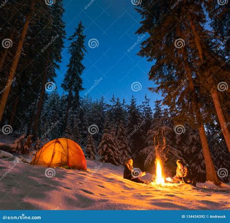 Camping With Campfire And Tent Outdoors In Winter Stock Photo Image
