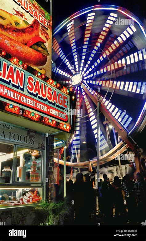A Night Shot Of The Ferris Wheel And Hot Dog Stand At The Dixie Classic