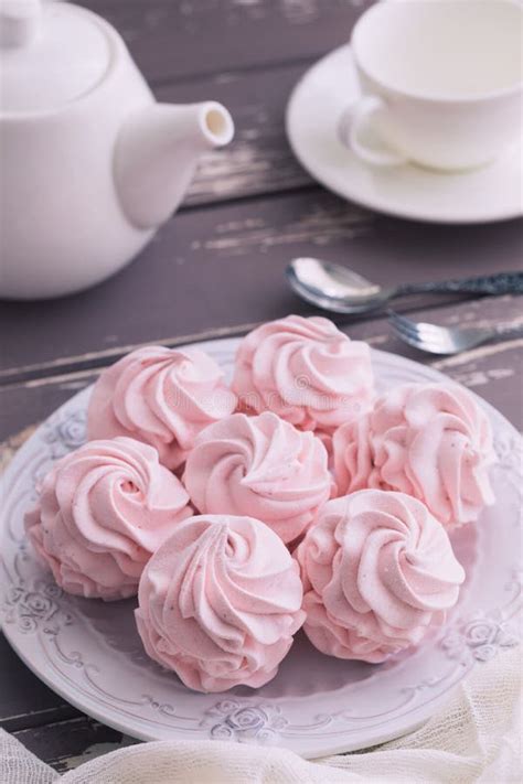 traditional russian homemade merengue marshmallow or zephyr on a plate on wooden background