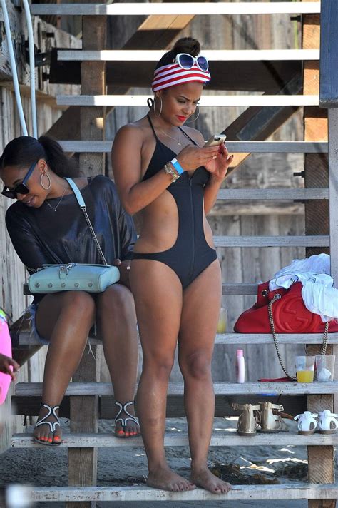 Christina Milian Wearing A Sexy Black Swimsuit At Paris Hiltons 4th Of