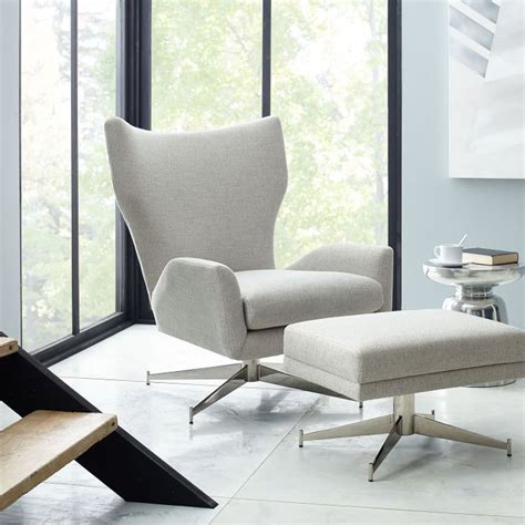 It is spacious enough to create a good environment for heavenly cuddling, rocking the baby to slumber, or even storytelling. Hemming Swivel Armchair | Furniture, Living room chairs modern