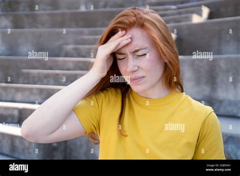 One Young Woman Massaging Temples Feeling Head Pain Stock Photo Alamy