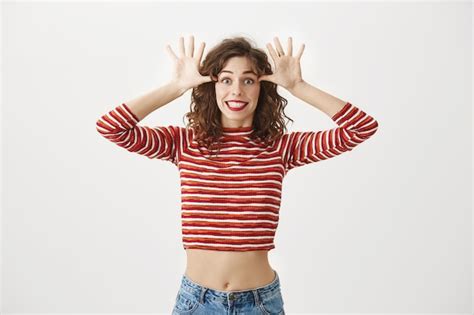 Free Photo Funny Playful Woman Mocking You And Smiling