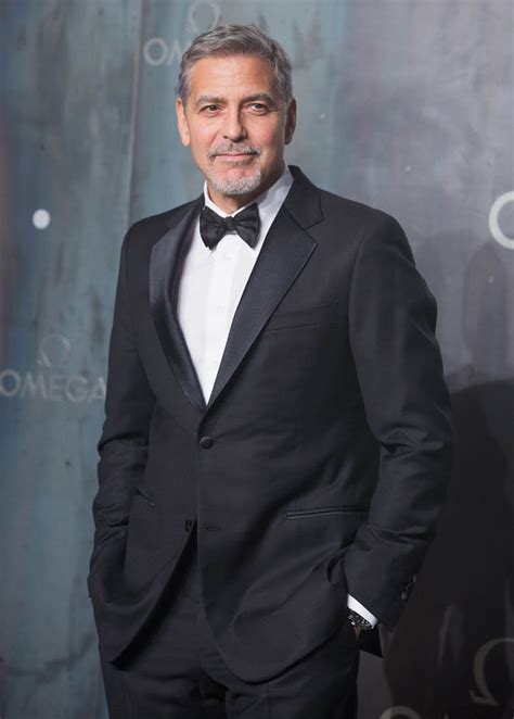 How's this for a beautiful picture of george? George Clooney looks sharp at OMEGA anniversary event