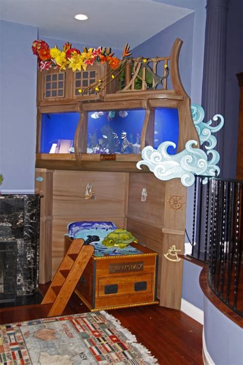 This salt water fish tank design looks great with the clear view of the ocean floor and the plants. 60 Magical Kids Rooms - Style Estate - | Kid room style ...