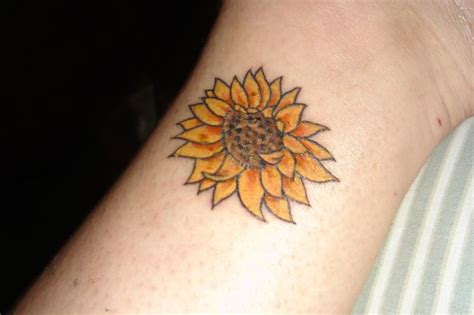 These are the kind of flowers which are tougher than other flowers and can grow exceptionally tall that they make a jungle of their own. 41 Graceful Flowers Wrist Tattoos